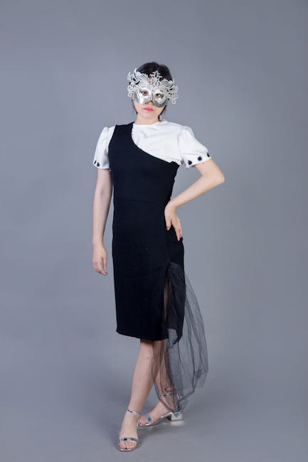 Elegant masquerade ball with guests in formal attire and decorative masks